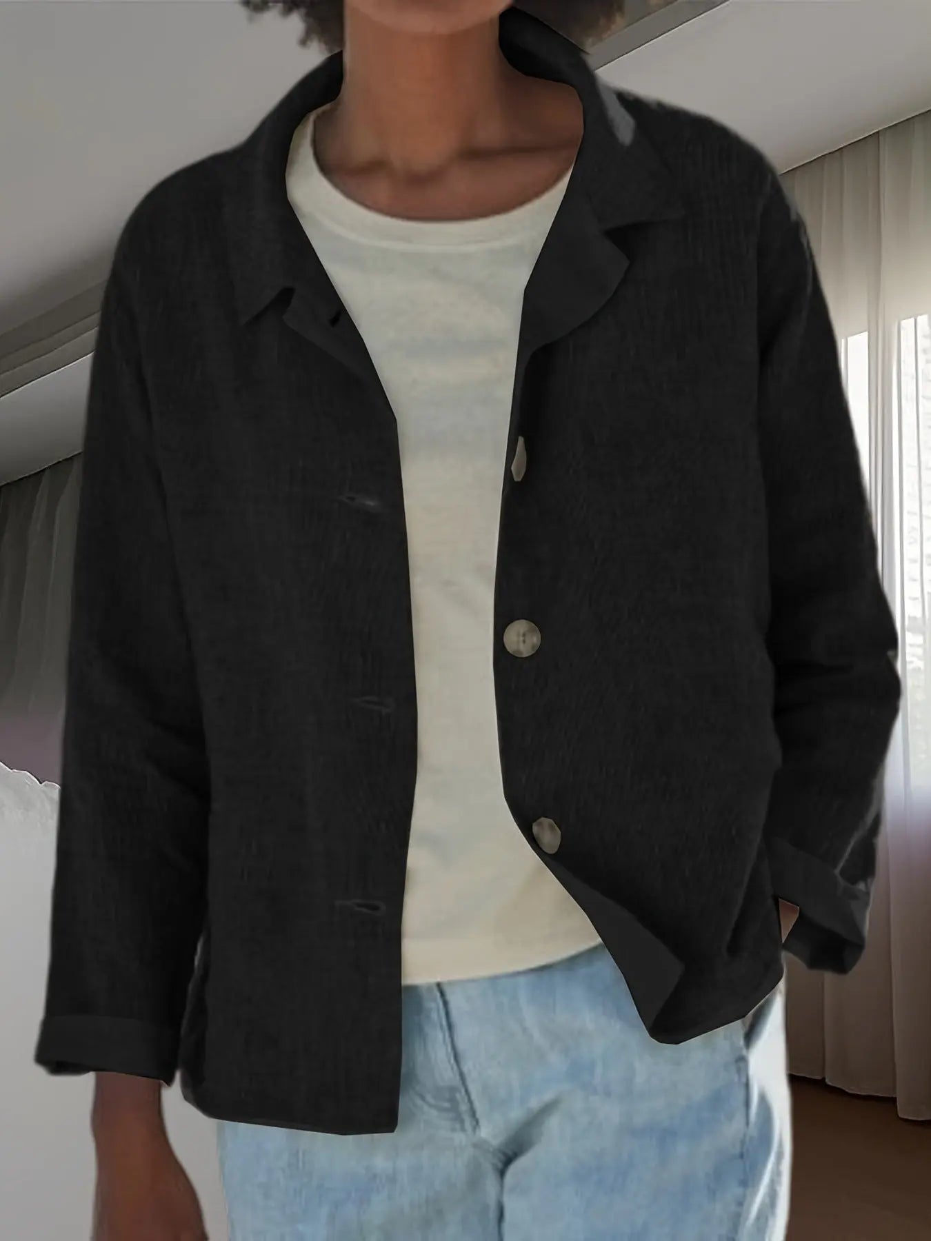 Black casual solid-color lapel long-sleeve jacket by Dropshipman, shown on a model with front view and relaxed fit.