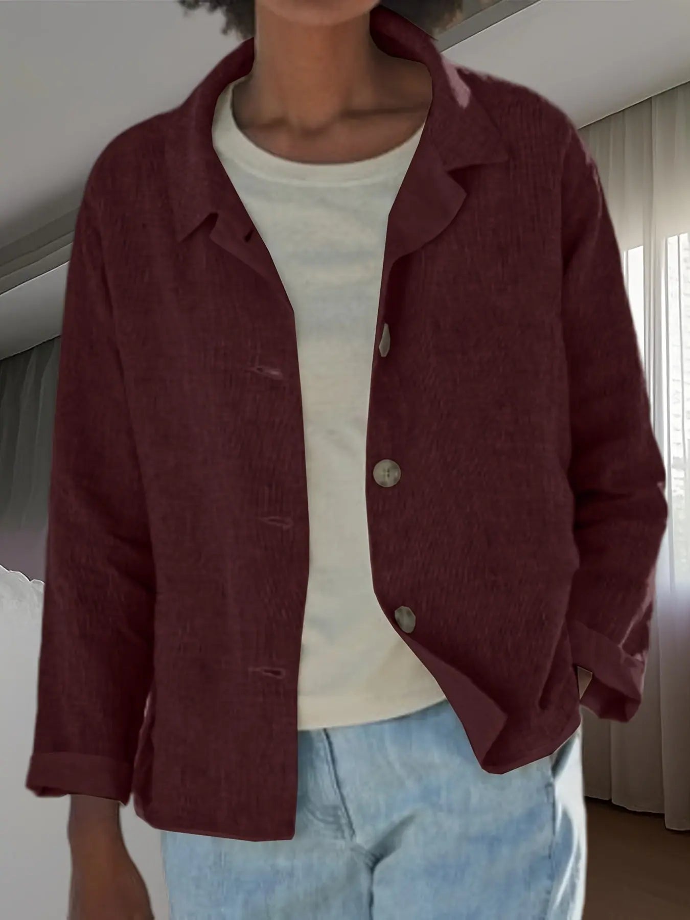 Black casual solid-color lapel long-sleeve jacket by Dropshipman, shown front view with collar and long sleeves.
