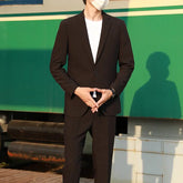 Black slim-fit suit jacket from Dropshipman, perfect for spring and autumn casual or versatile stylish occasions.