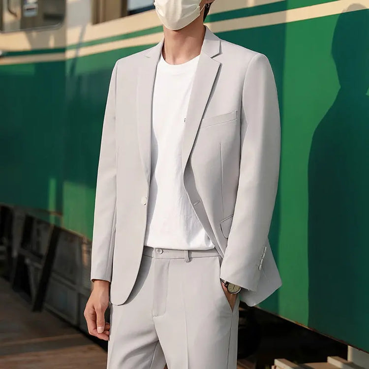 Black slim-fit suit jacket, trendy casual style from Dropshipman, perfect for spring and autumn versatile fashion.