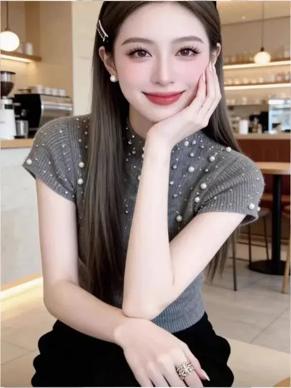 Gray casual short-sleeved knit top by Dropshipman, featuring a unique textured design and comfortable fit.