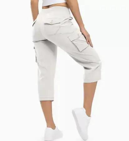 Ladies' 7-inch khaki lightweight hiking and outdoor travel loose shorts by Dropshipman, shown on a model with a casual outdoor setting.