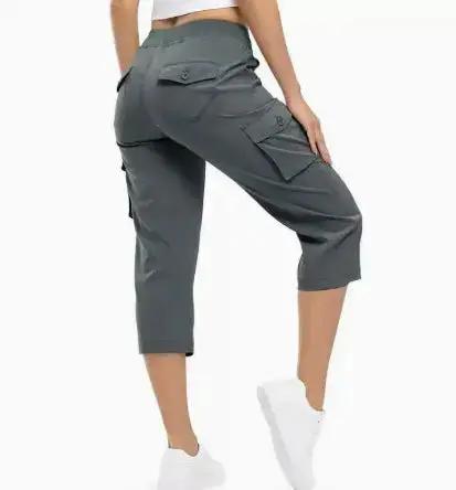 Ladies' 7-inch lightweight khaki hiking and outdoor travel loose shorts by Dropshipman, shown on a model outdoors.