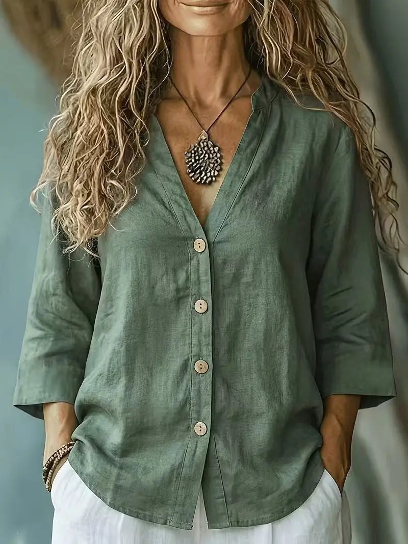 Light blue women's linen shirt with loose fit, V-neck, and button-up front, designed for casual style by Dropshipman.