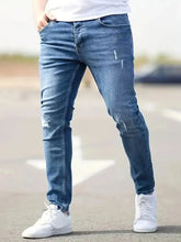 Light blue American-style slim-fit stretch jeans by Dropshipman, showing the fit and denim fabric details.