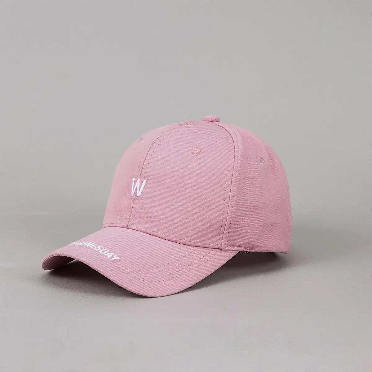 Light pink embroidered letter baseball cap for men and women, stylish and sun-protective, ideal for outdoor outings and casual wear.