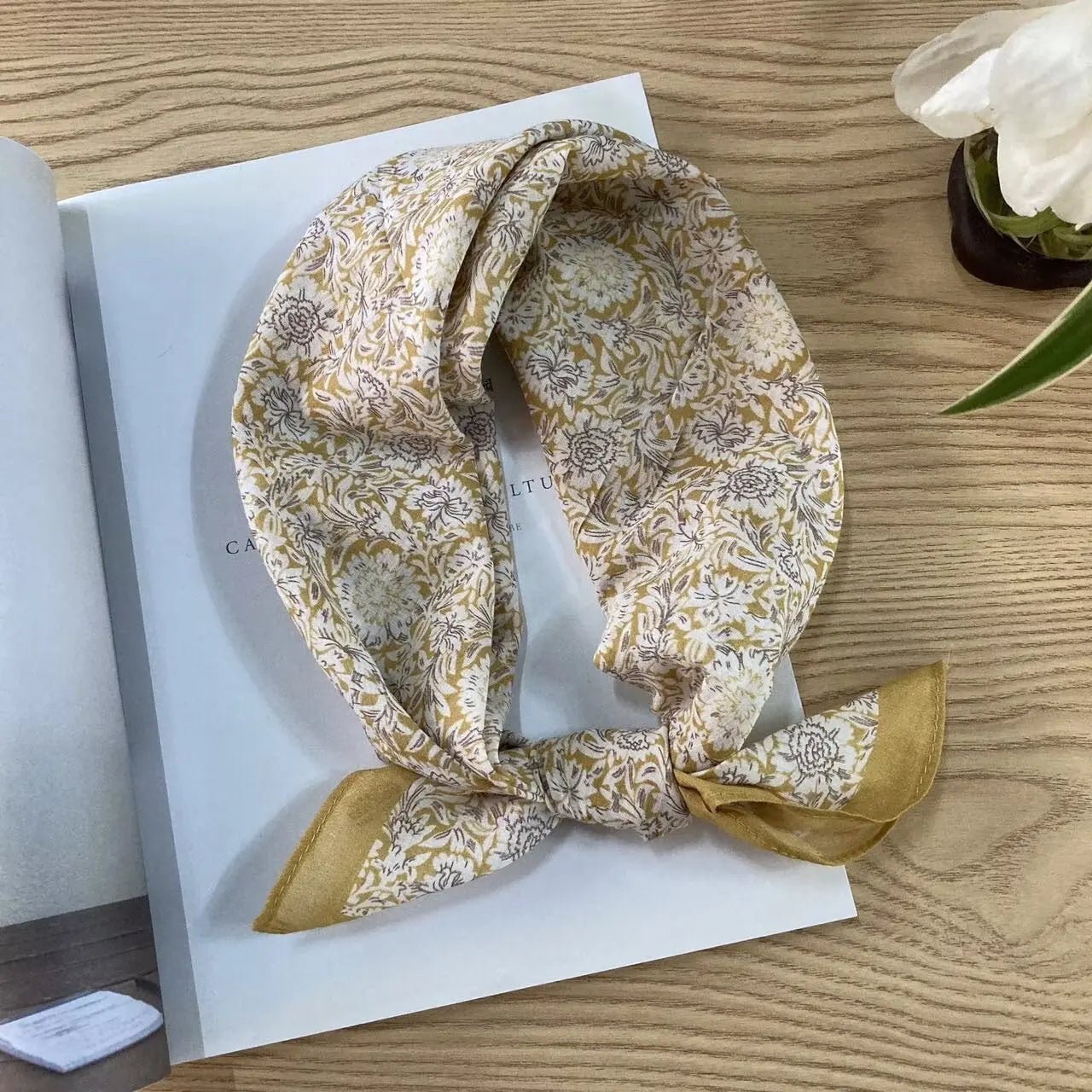 Vintage cotton square scarf with ethnic floral pattern in vibrant colors, featuring silk-like texture and intricate design.