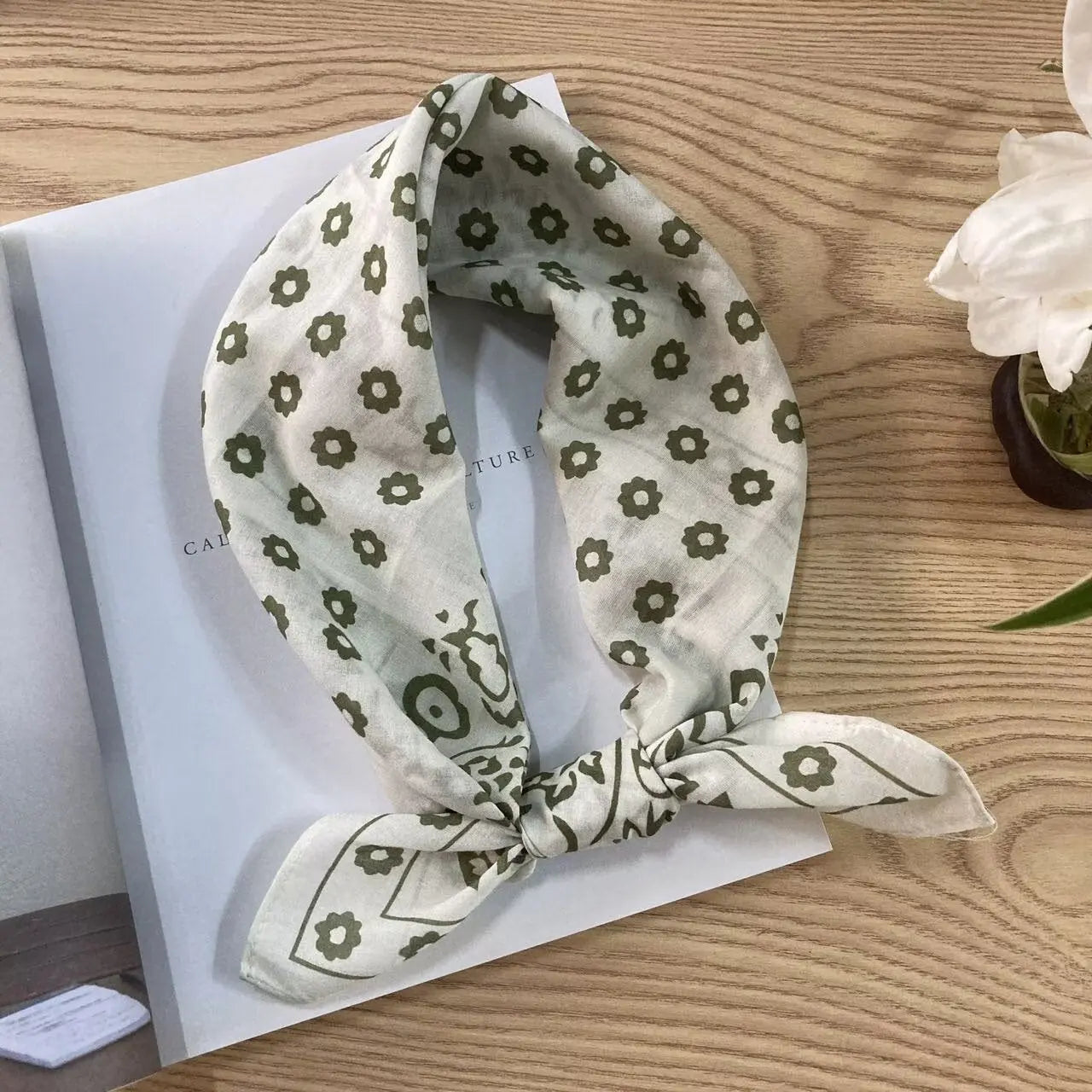 Cotton square vintage ethnic-style floral silk scarf featuring colorful floral patterns and intricate design details.