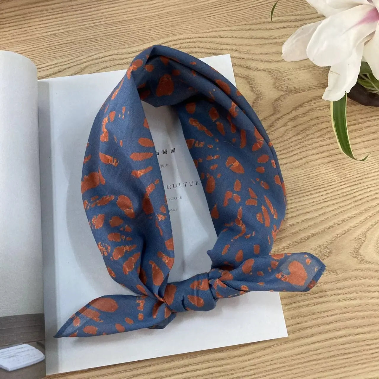 Cotton square vintage floral silk scarf with ethnic-style pattern, featuring colorful floral designs on a soft fabric.