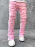 Pink ripped jeans for men with fringes, patched details, long tight fit, and stacked style, by Dropshipman.