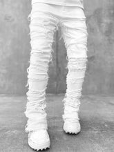 Pink Ins Fringes ripped trousers for men, featuring patched design, long tight fit, and stacked style by Dropshipman.