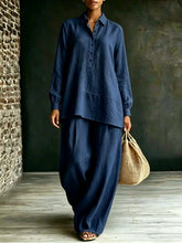 Pink shirt and loose-fit pants two-piece set from Dropshipman, casual and comfortable outfit for everyday wear.