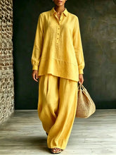 Pink shirt and loose-fit pants two-piece set by Dropshipman, casual and comfortable clothing ensemble.