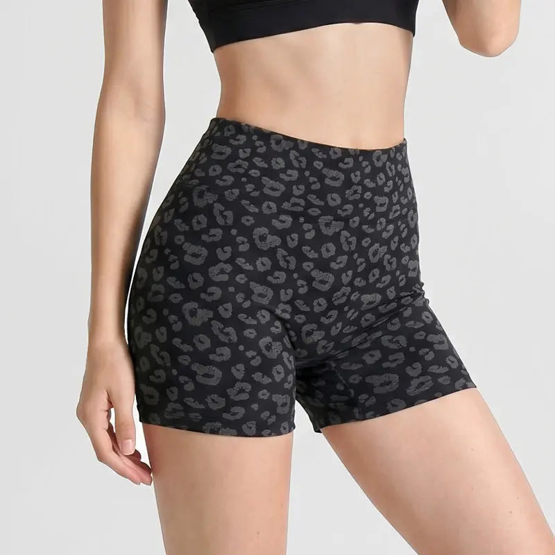 Black leopard-print yoga shorts by Dropshipman, designed for fitness and exercise, featuring a comfortable, stretchy fit.