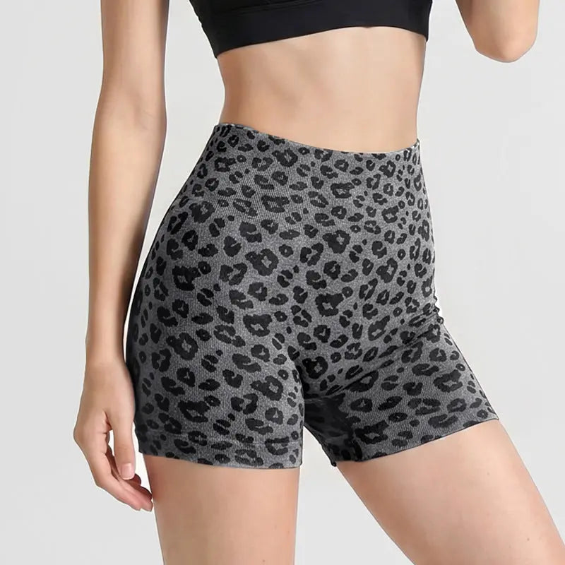 Black leopard-print yoga shorts by Dropshipman, designed for fitness and exercise, with a comfortable and flexible fit.