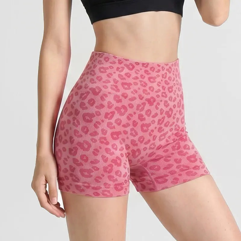 Black leopard-print yoga shorts for fitness and exercise by Dropshipman, showcasing comfortable, flexible athletic wear.