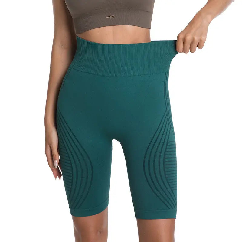 Sky blue Dropshipman butt-lifting and thigh-slimming five-point yoga pants for women, showing a close-up of the fitted design.
