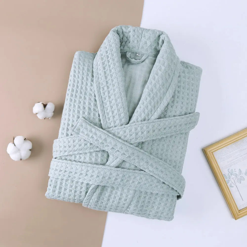 White cotton double waffle unisex long robe with thickened fabric, featuring a cozy and comfortable design for lounging or sleep.