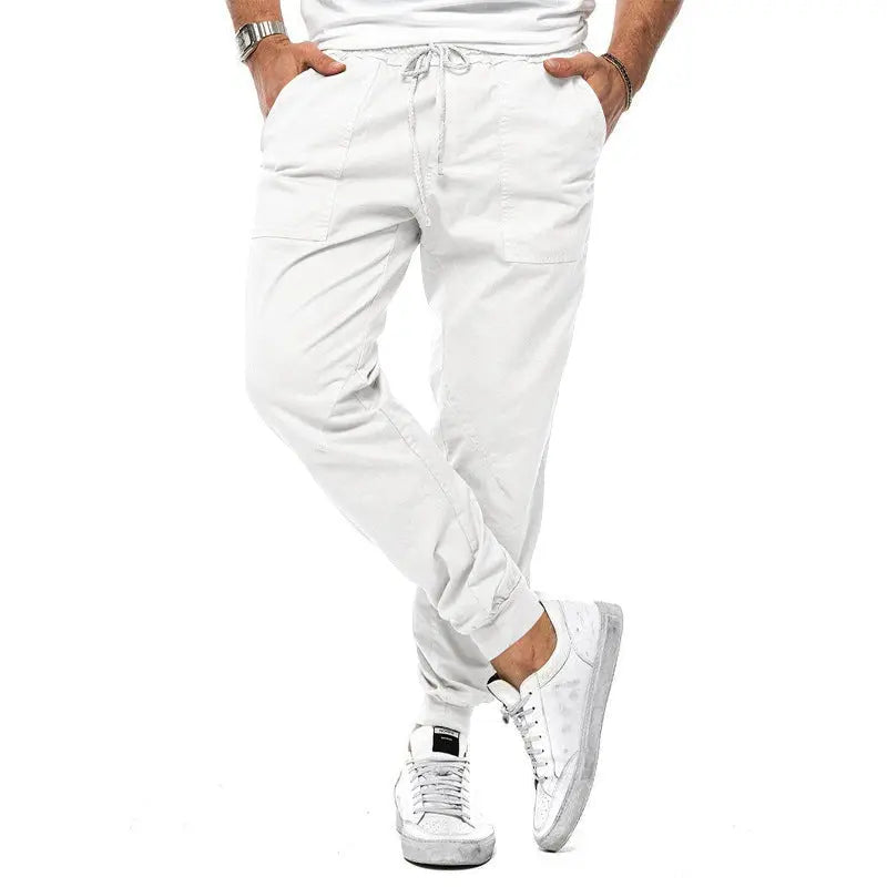 White men's casual pants by Dropshipman featuring loose tapered fit, suitable for spring, autumn, sports, and outdoor leisure activities.