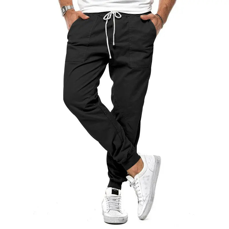 White men's casual pants by Dropshipman featuring loose fit, tapered legs, suitable for spring and autumn outdoor sports and leisure.