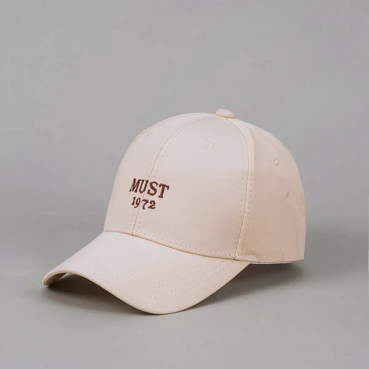 White baseball cap for men and women with embroidered letters, casual style suitable for outdoor outings and daily wear by Dropshipman.