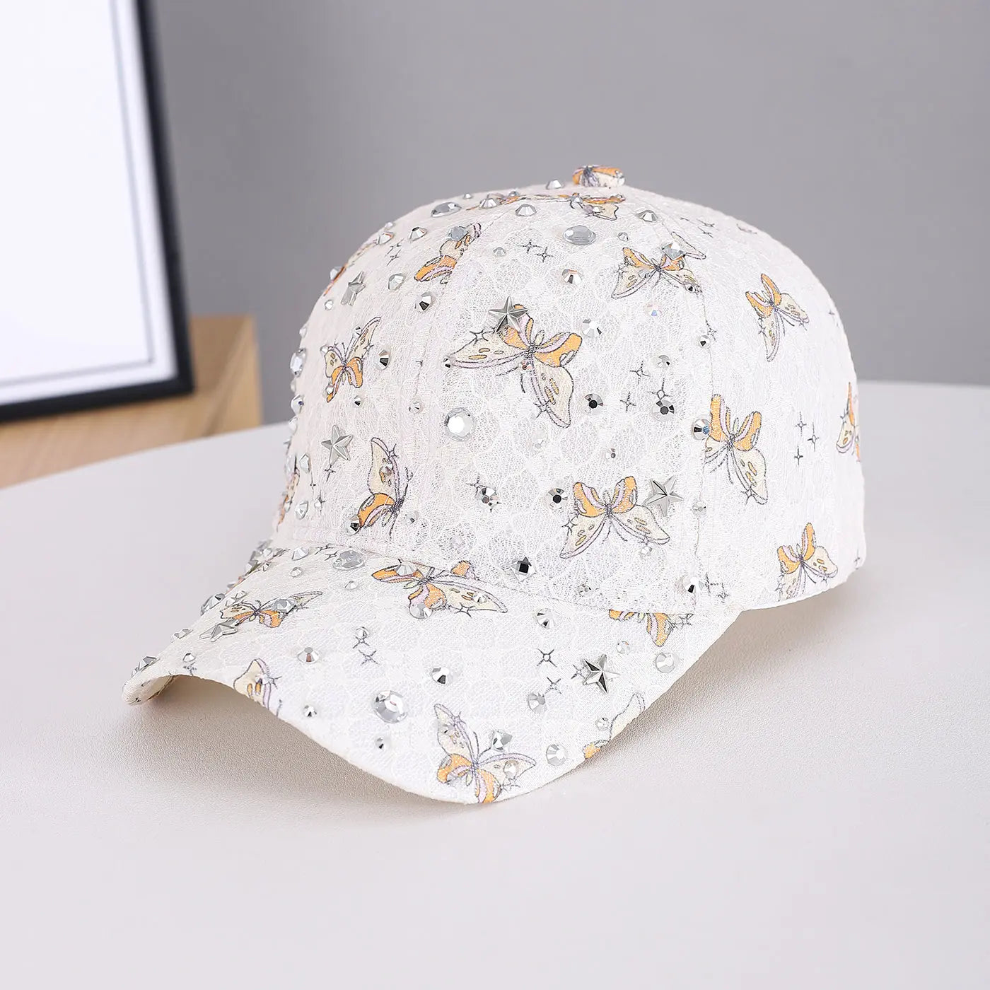 White and pink lady's lace butterfly silver diamond star accessory with a street style baseball cap, suitable for outdoor and casual wear.