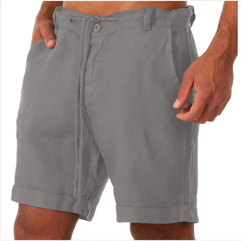 Men’s white sports running shorts from Dropshipman with a solid color design, casual style, and adjustable drawstring waist.