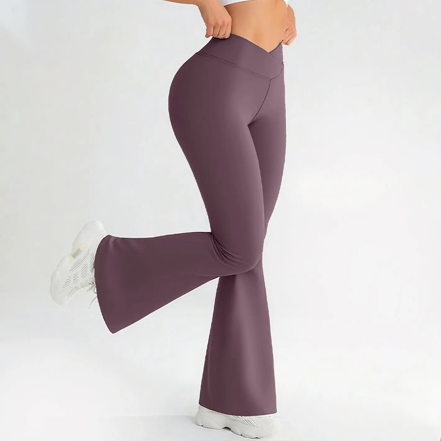 Black cross-waist yoga pants by Dropshipman featuring hip-lifting and butt-lifting design, ideal for fitness and workout activities.