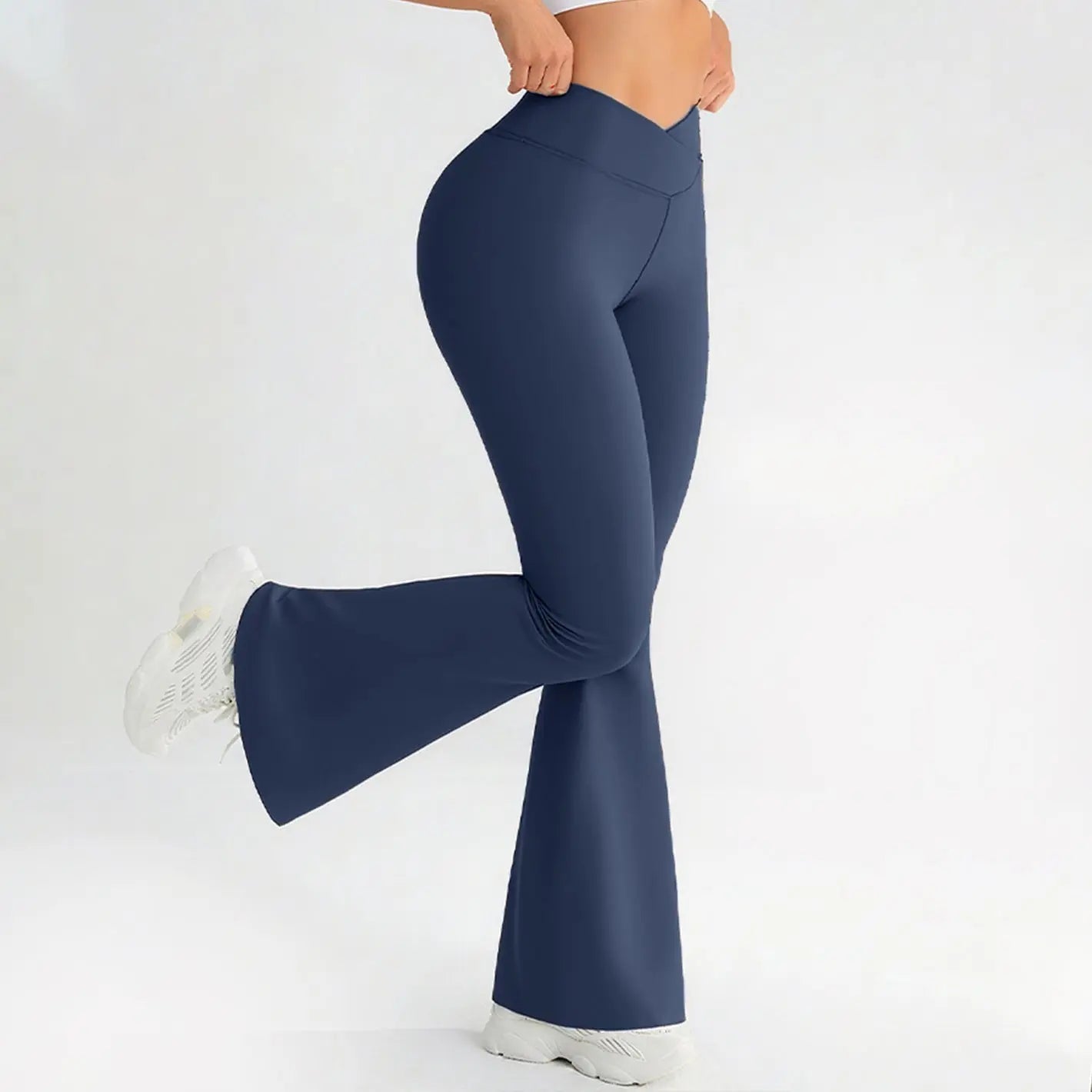 Black cross-waist yoga fitness pants by Dropshipman with hip-lifting and butt-lifting design, perfect for workout and yoga sessions.