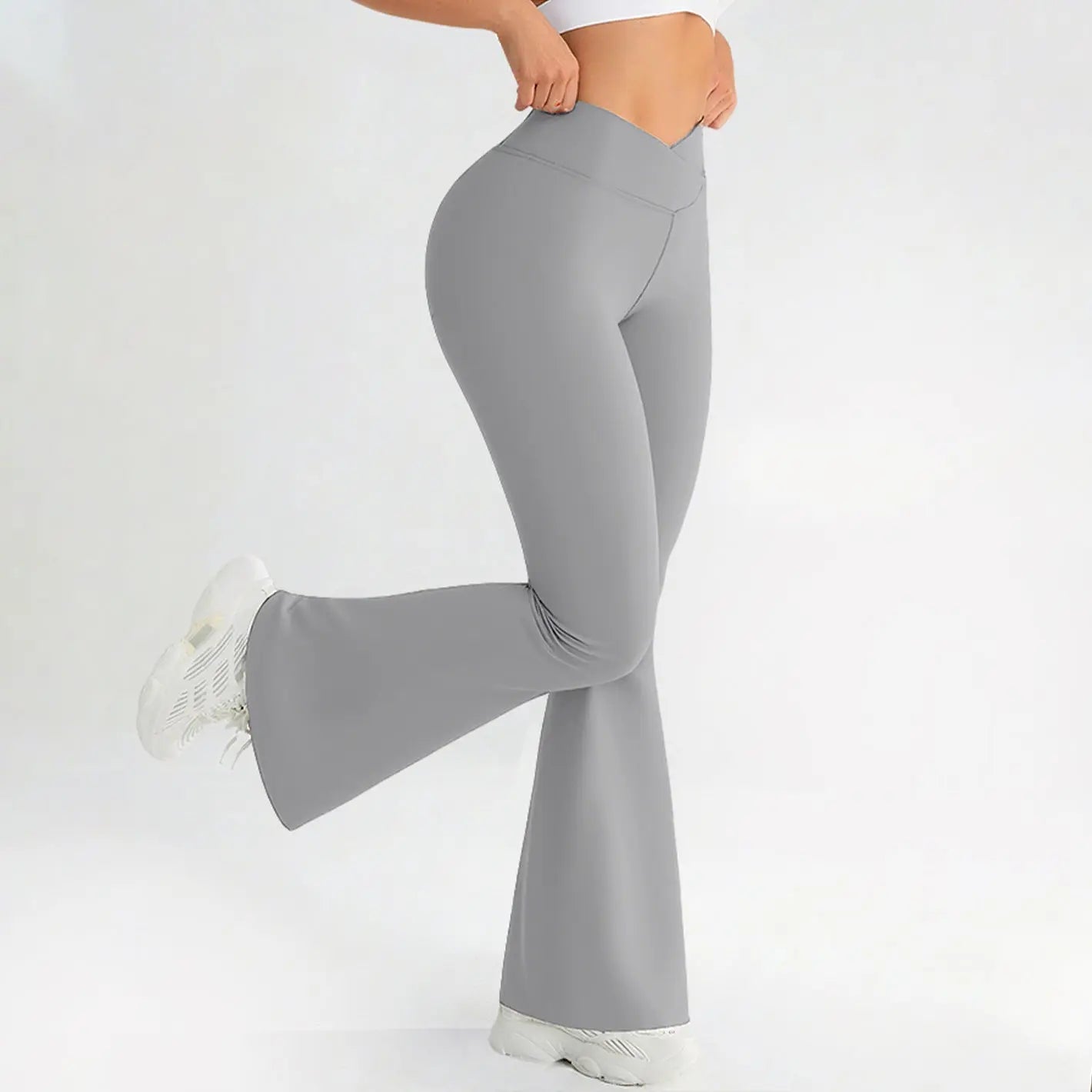 Black cross-waist yoga pants by Dropshipman with hip-lifting and butt-lifting design, suitable for fitness and yoga workouts.