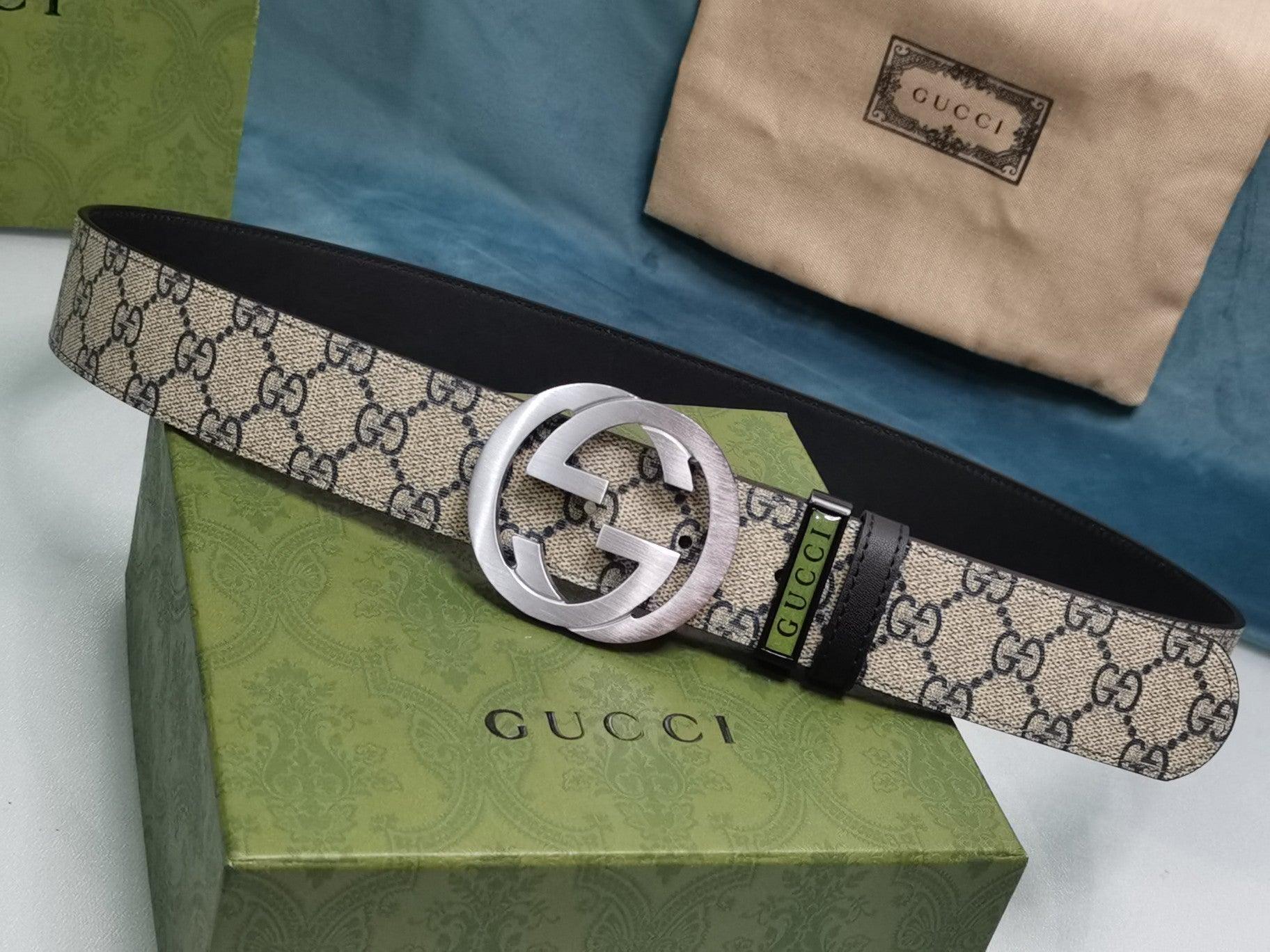 GUCCI Embellished coated-canvas and leather belt &