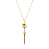Ezra Bullet Tassel Necklace made of recycled brass with artisan craftsmanship and statement design.
