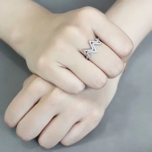 Ezra DA339 stainless steel ring with AAA grade clear CZ gemstone, showcasing a sleek and modern jewelry design.