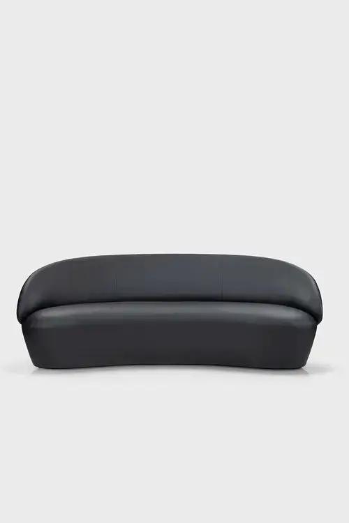 Ezra Naïve sofa in green velour fabric, two-seater design with plush cushions and modern style for cozy living rooms.