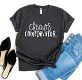 Navy Ezra Chaos Coordinator Tee, a premium graphic T-shirt featuring bold design and Ezra branding, displayed on a mannequin.