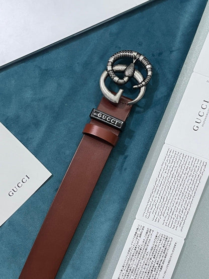 GUCCI Embellished coated-canvas and leather belt &