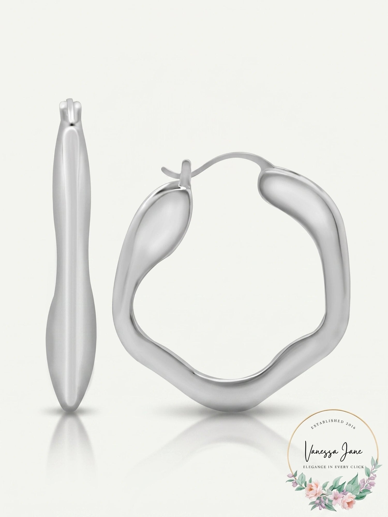 And Now This Silver Plated Wave Look Click Top Earrings