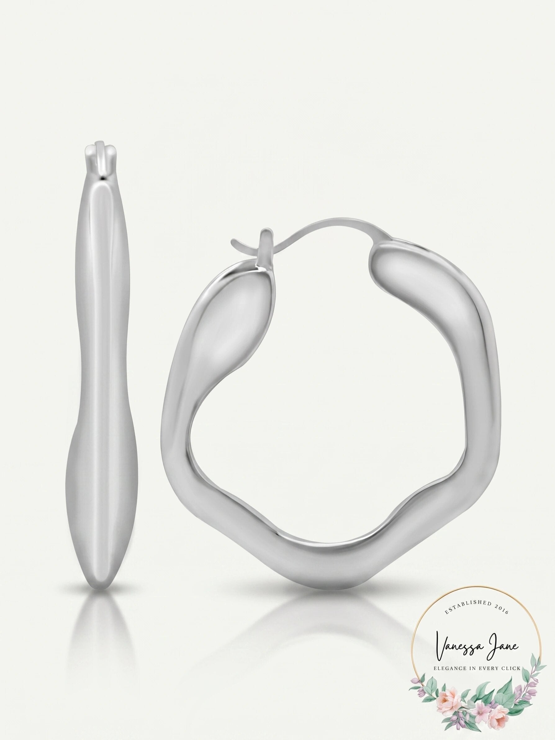 And Now This Silver Plated Wave Look Click Top Earrings