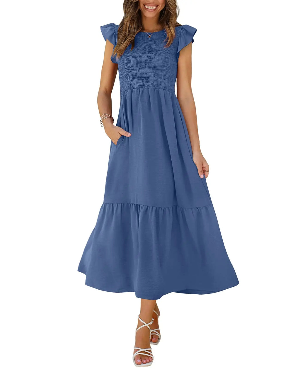 Petite flowy maxi dress in blue, featuring flutter sleeves and pockets, perfect for casual occasions.
