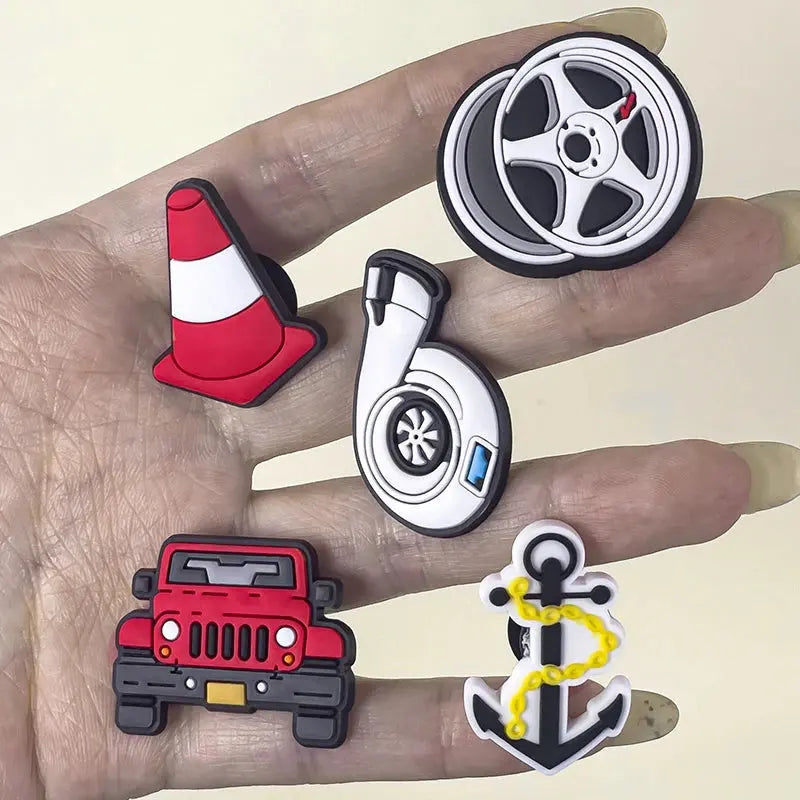 Set of 9 Jeep sports car shoe charms with turbine hub and ship's anchor pin decorations for boys and kids.