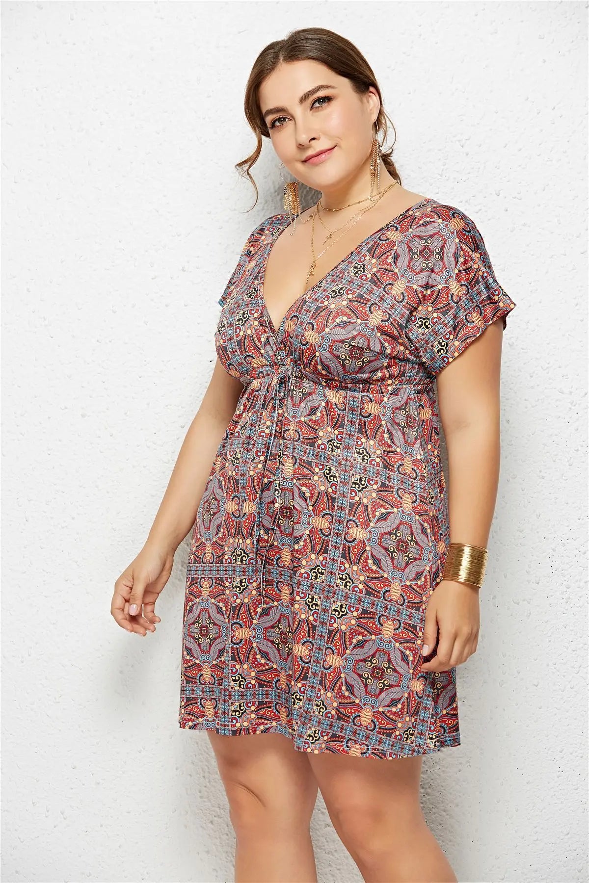 Printed deep V-neck dress with elastic waist by SHOPEZRA L.L.C., featuring a stylish design and comfortable fit.