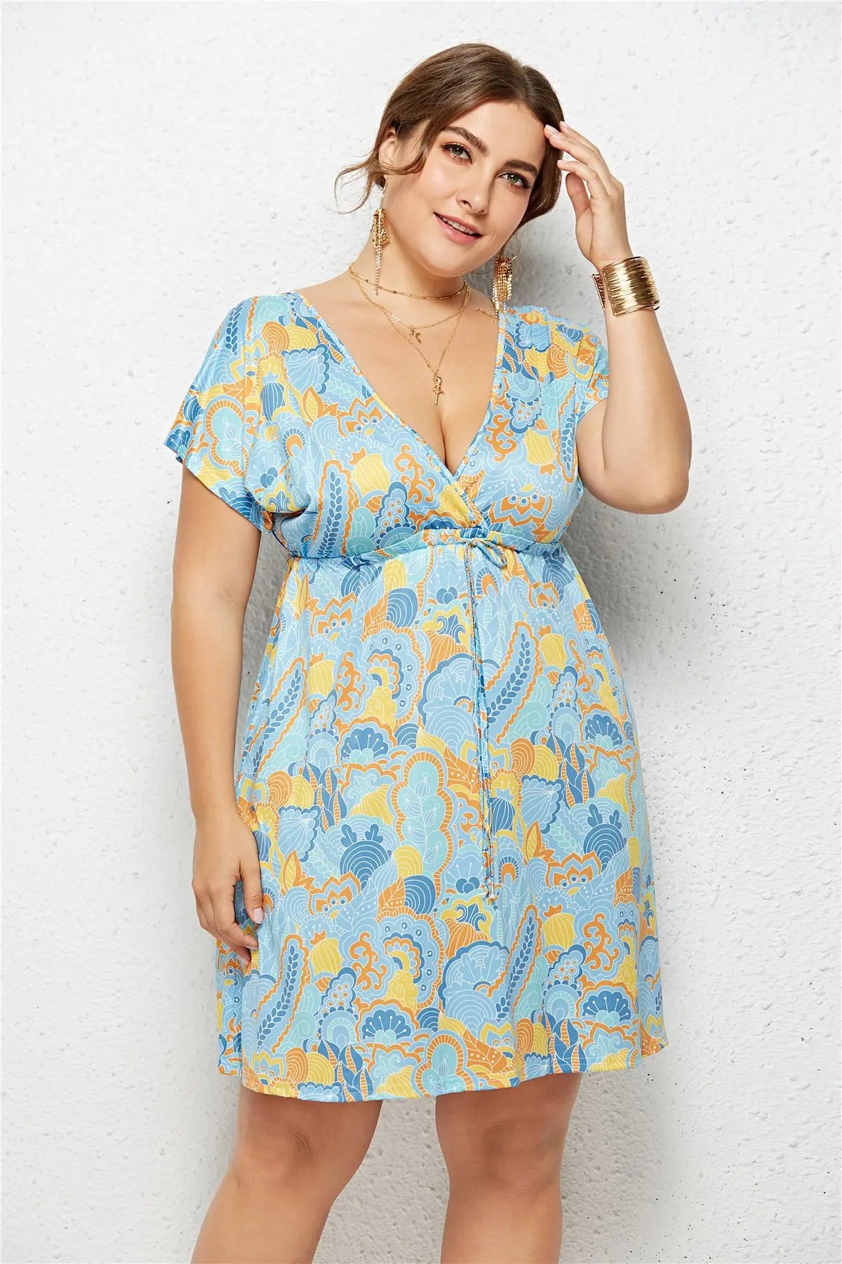 Printed deep V-neck dress with elastic waist by SHOPEZRA L.L.C., shown in a stylish design and comfortable fit.