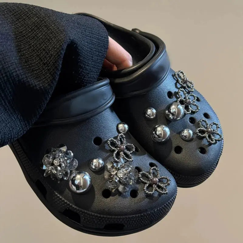 Silver rhinestone flower shoe charms with metal beads, bow and heart designs, perfect for DIY punk Y2K style clogs.