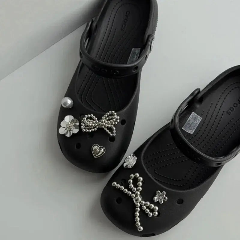 Silver rhinestone flower shoe charms with bow and heart designs by SHOPEZRA L.L.C., perfect for DIY punk Y2K style clog decoration.
