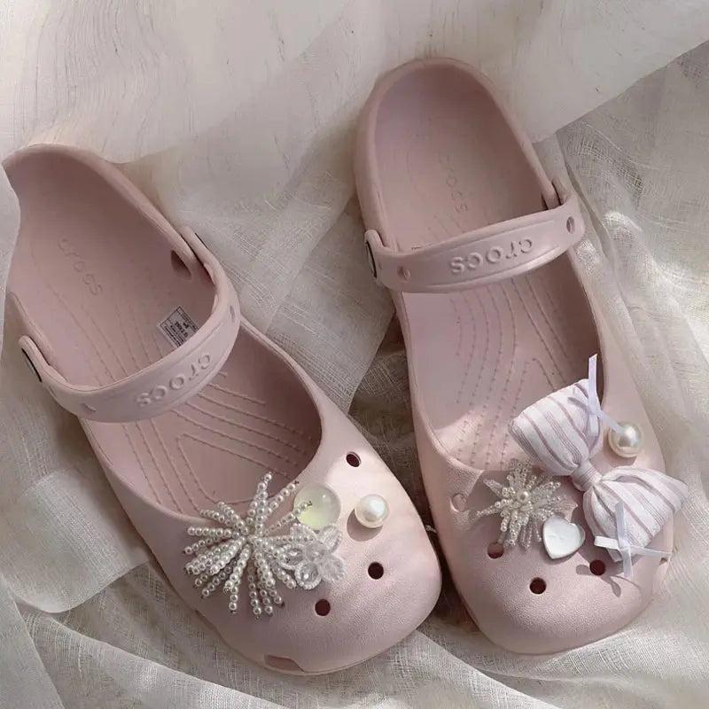 Silver rhinestone flower shoe charms with metal beads, bows and hearts, perfect for DIY punk Y2K style clogs.