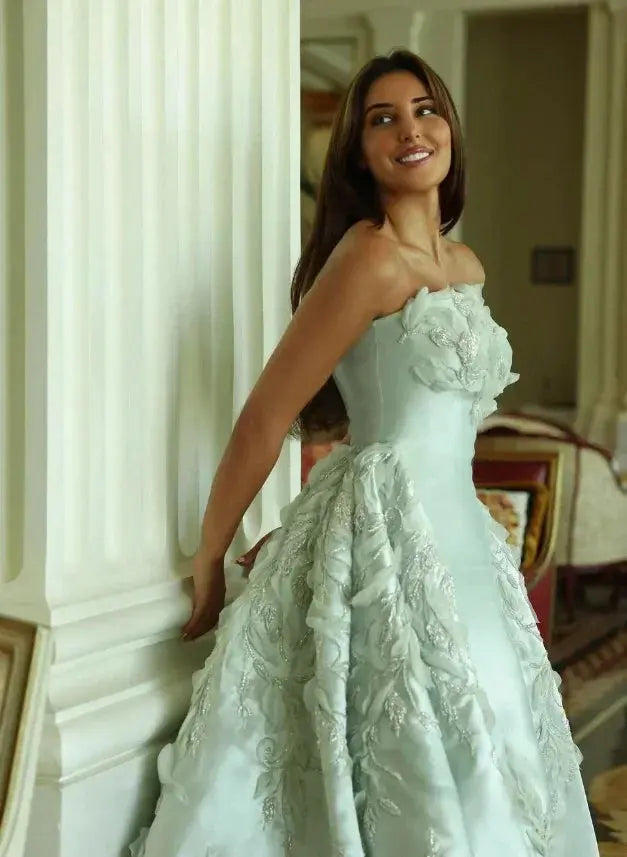 Elegant women's customized evening dress by SHOPEZRA L.L.C., shiny formal gown with a fitted silhouette for special occasions.