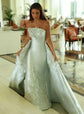 Elegant customized evening dress for women with shiny fabric, featuring a formal cocktail gown style for special occasions.