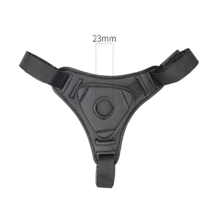 Realistic wearable dildo with strap-on harness, suction cup base, and anal plug, designed for adult lesbian women and couples.