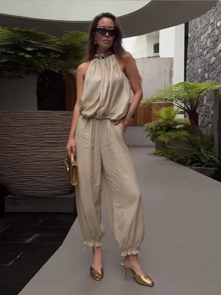 Beige beaded halter neck bubble top with high-waist wide-leg linen blend pants, casual summer resort outfit by SHOPEZRA L.L.C.