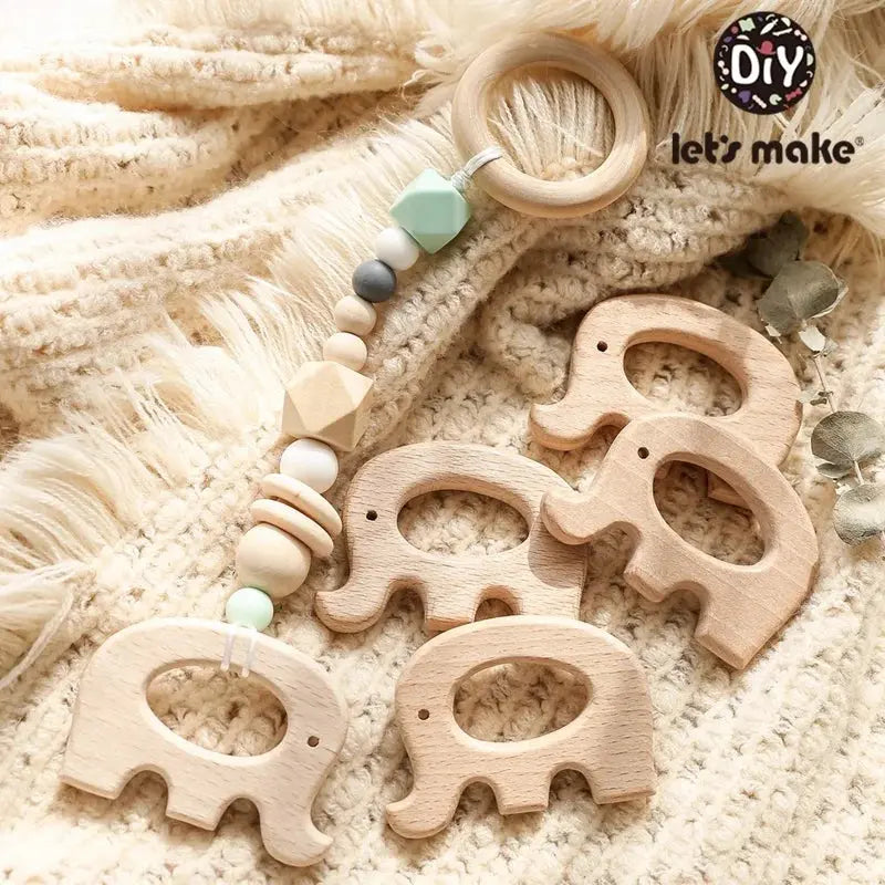 Wooden baby teether with a beech koala animal pendant, BPA-free teething toy suitable for infants and kids.